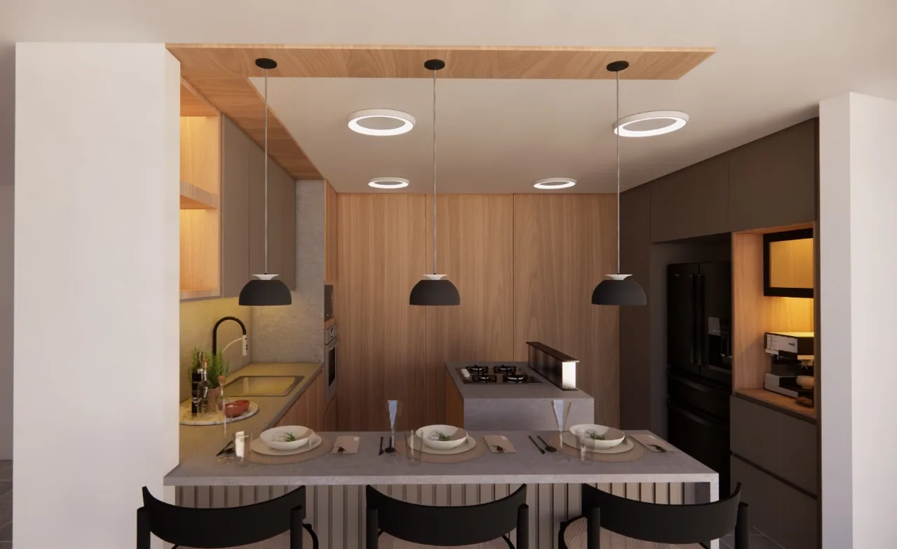 Render de cocina calida con isla central, lamparas colgantes y luz indirecta